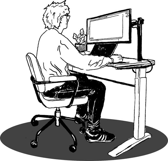 Chris working at his computer